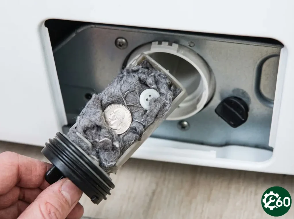 گرفتگی فیلتر پمپ تخلیه لباسشویی با سکه و آشغال